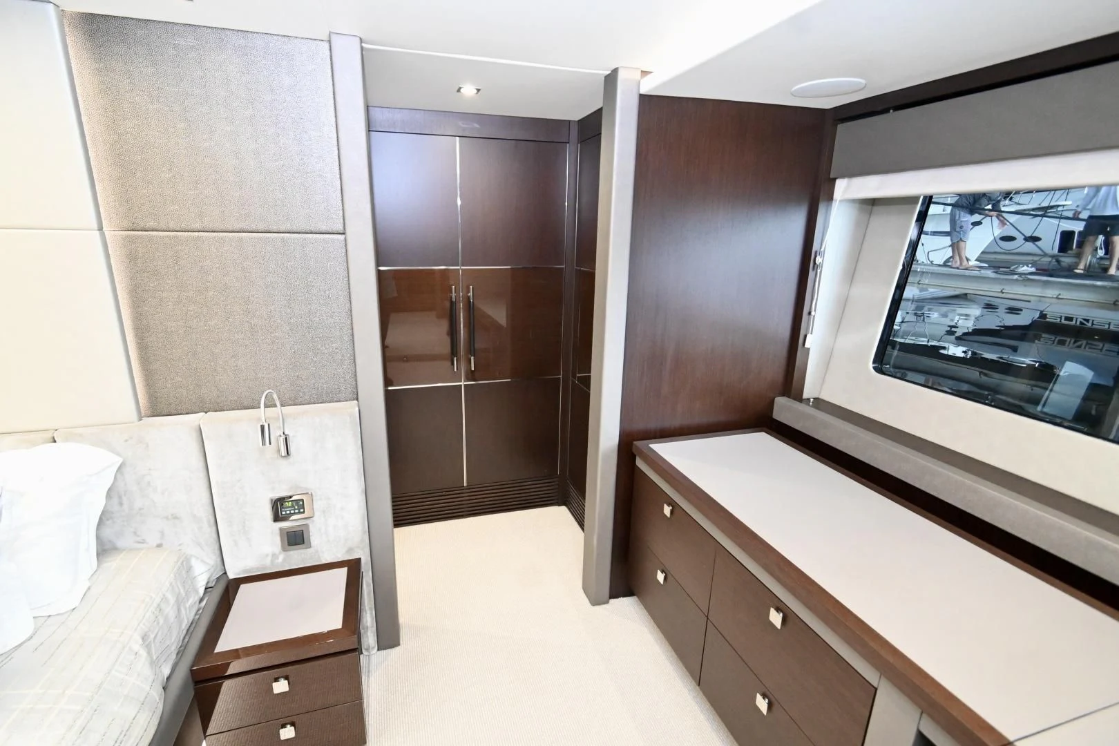 a room with a bed and a television aboard CAESURA Yacht for Sale