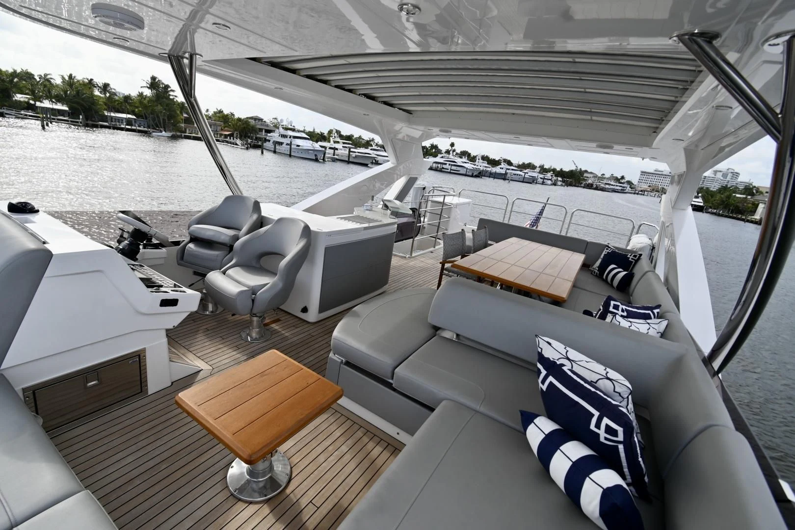 a large living room with a large deck aboard CAESURA Yacht for Sale