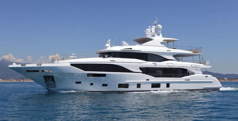 a white yacht on the water aboard OLI Yacht for Sale