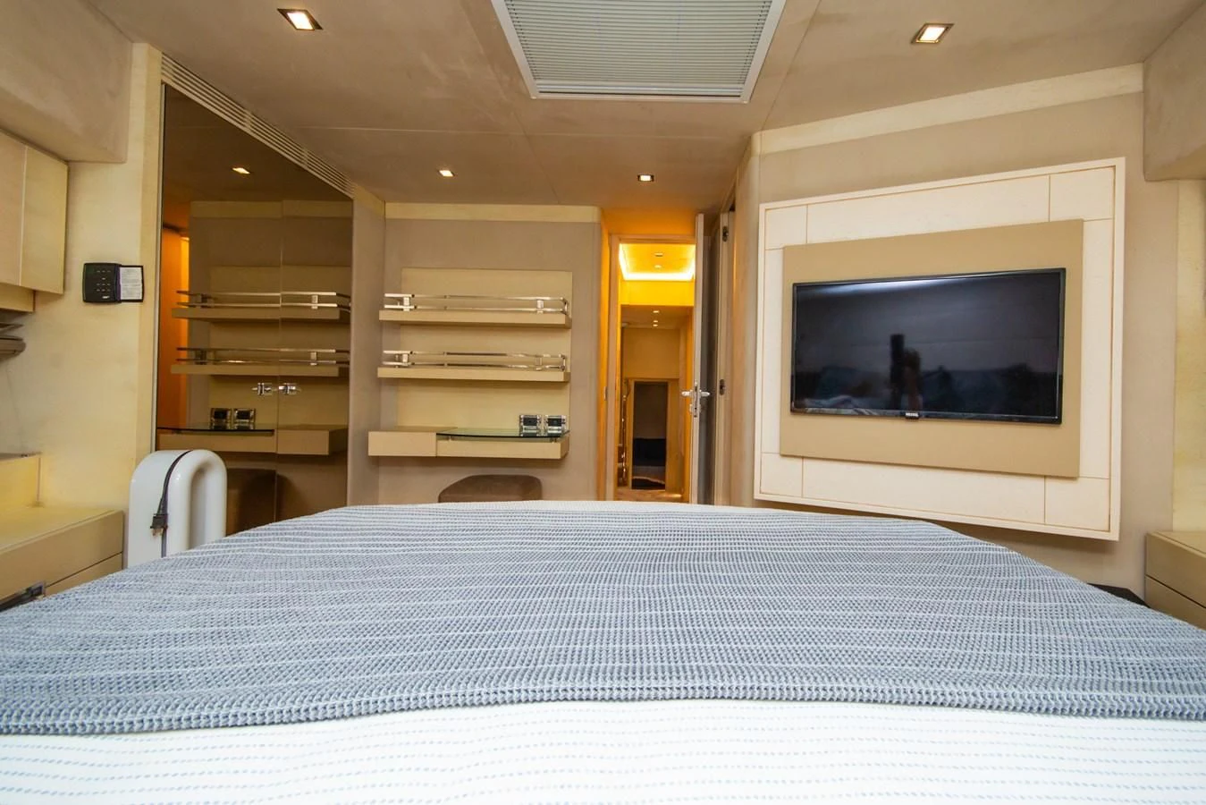 a bed in a room aboard AZIMUT 86S Yacht for Sale