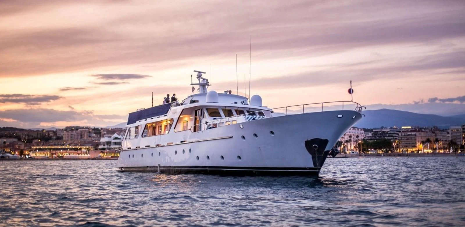 a white boat on the water aboard MISS EVA Yacht for Sale
