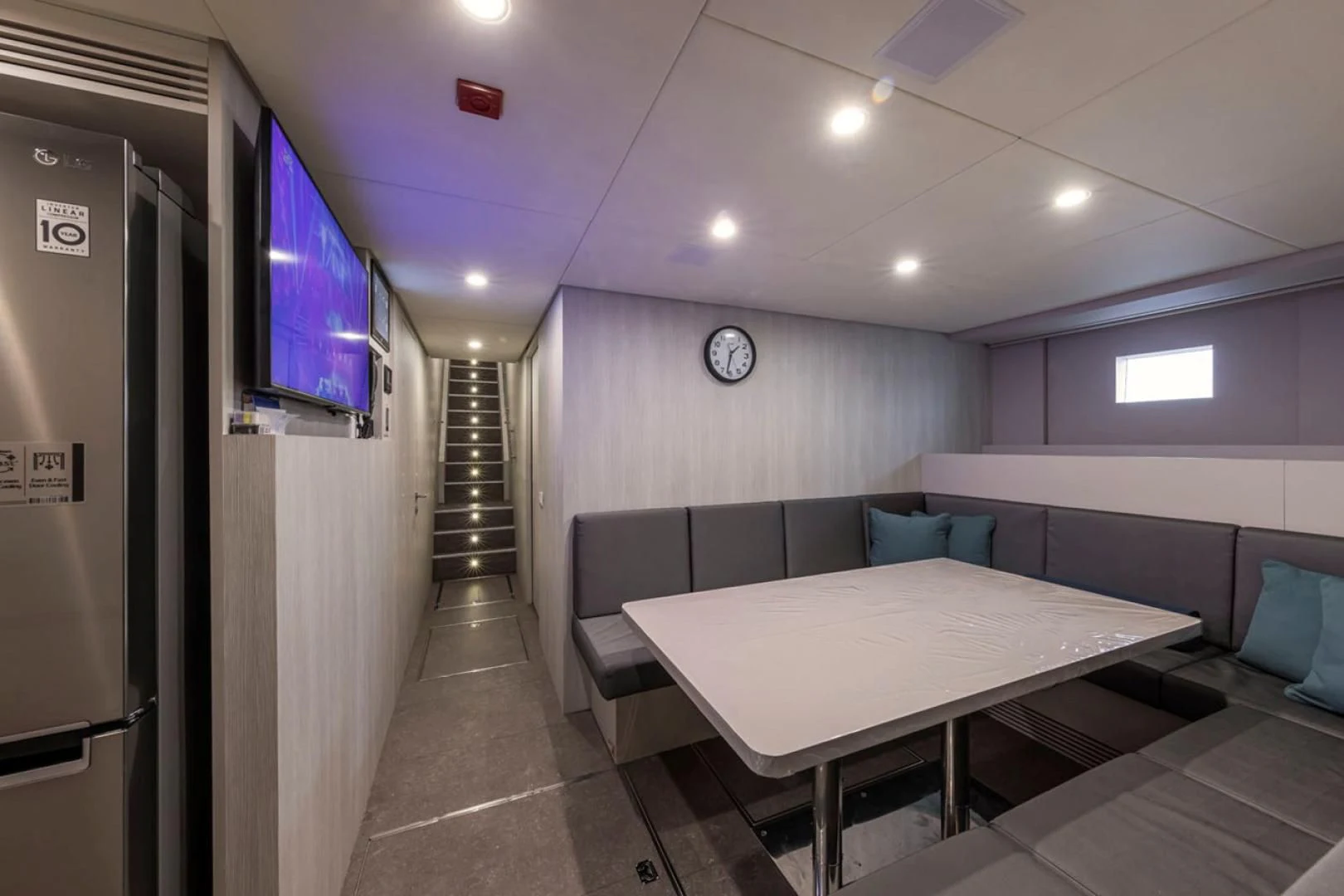 a room with a table and chairs aboard 38M EXPLORER HULL 3 Yacht for Sale