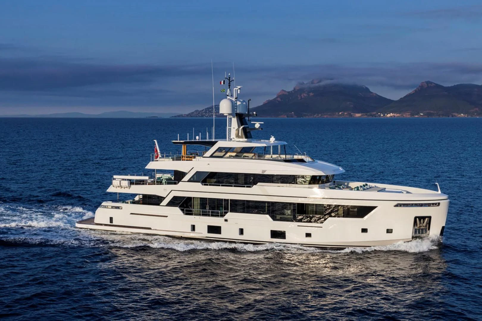 a white boat on the water aboard 38M EXPLORER HULL 3 Yacht for Sale