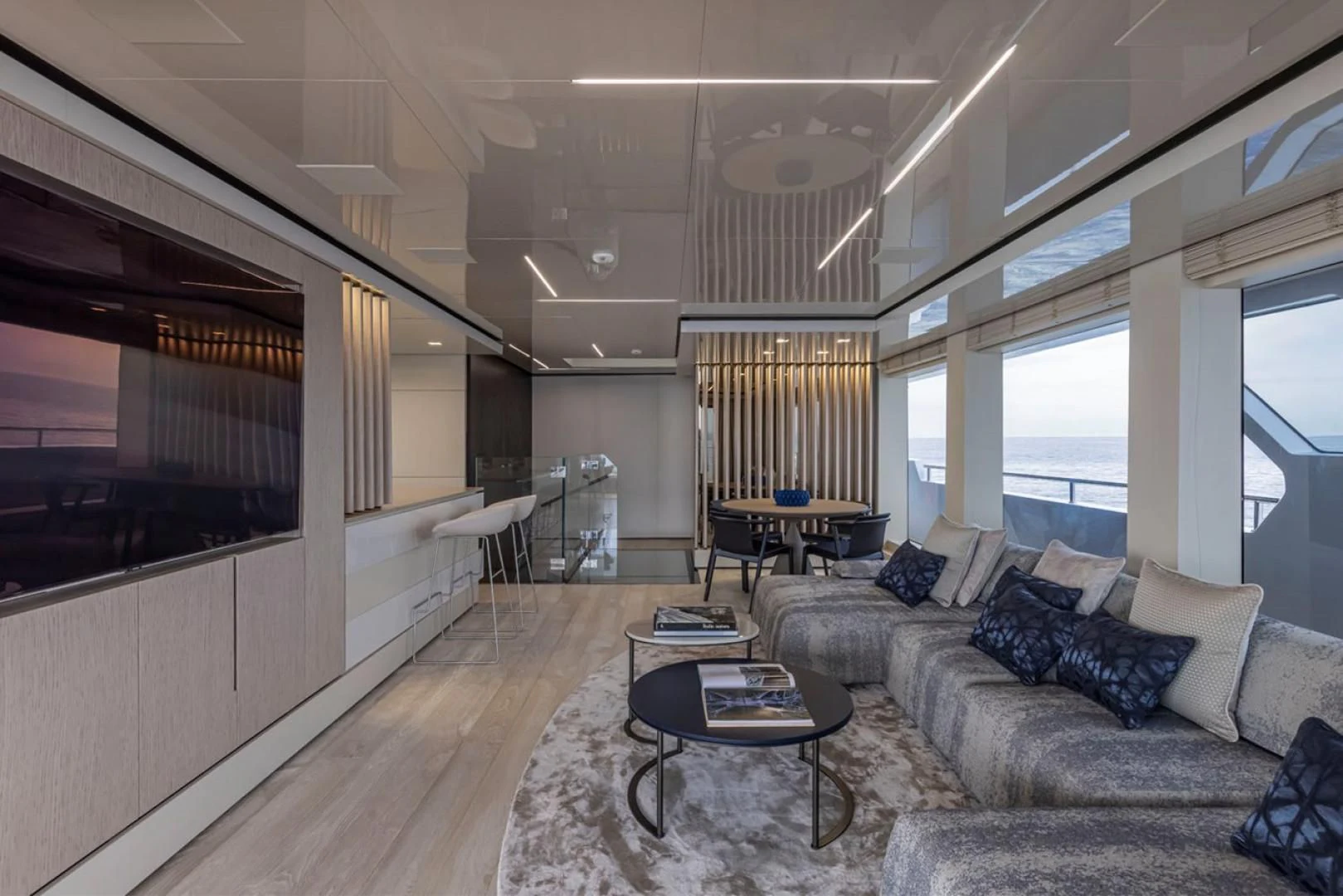 a living room with a large window aboard 38M EXPLORER HULL 3 Yacht for Sale
