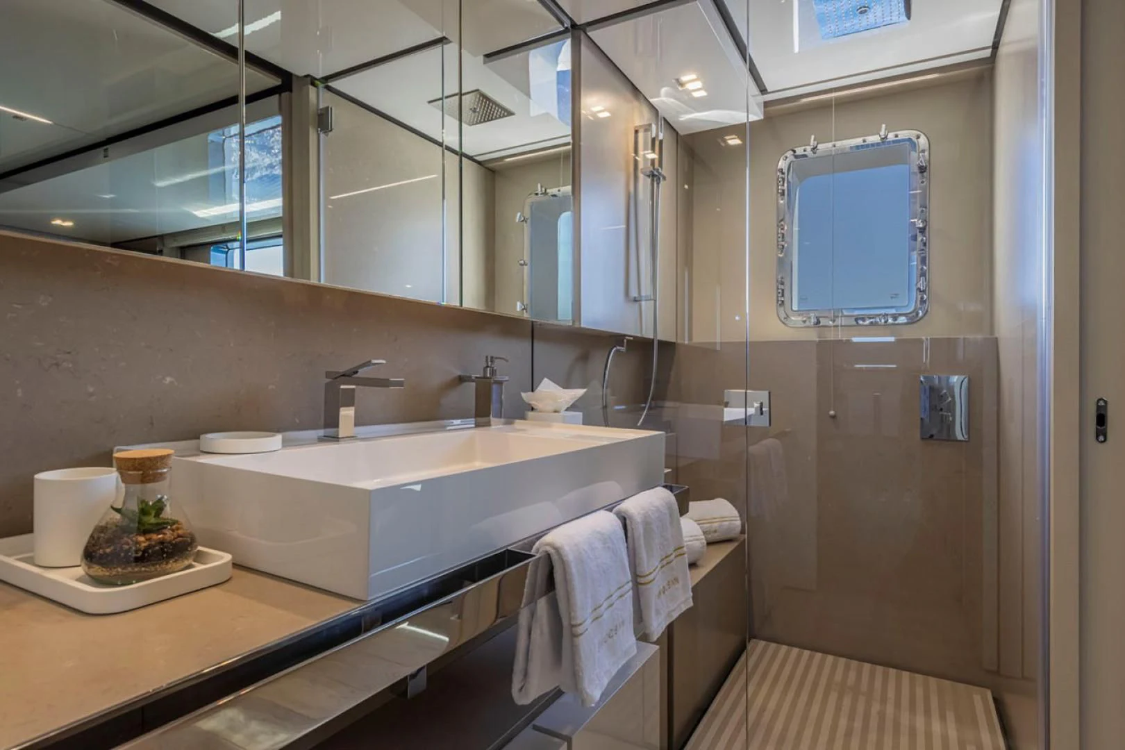 a bathroom with a large mirror aboard 38M EXPLORER HULL 3 Yacht for Sale