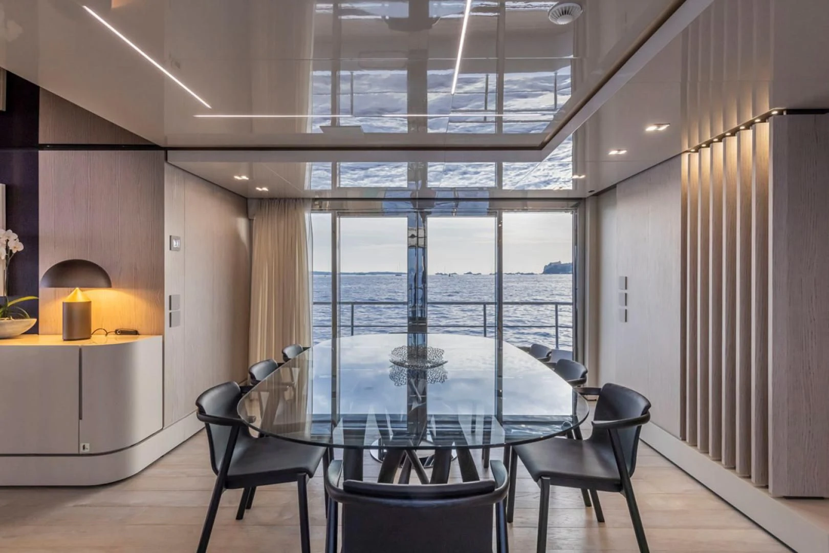 a room with a table and chairs aboard 38M EXPLORER HULL 3 Yacht for Sale