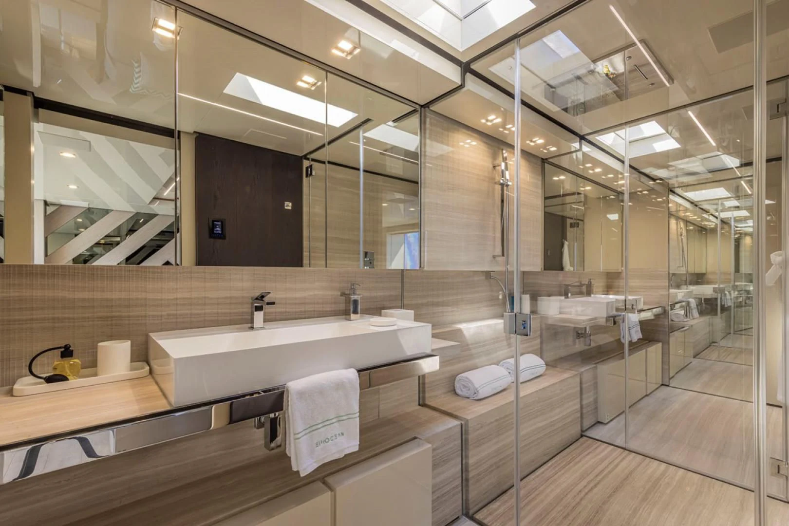 a bathroom with a large mirror aboard 38M EXPLORER HULL 3 Yacht for Sale