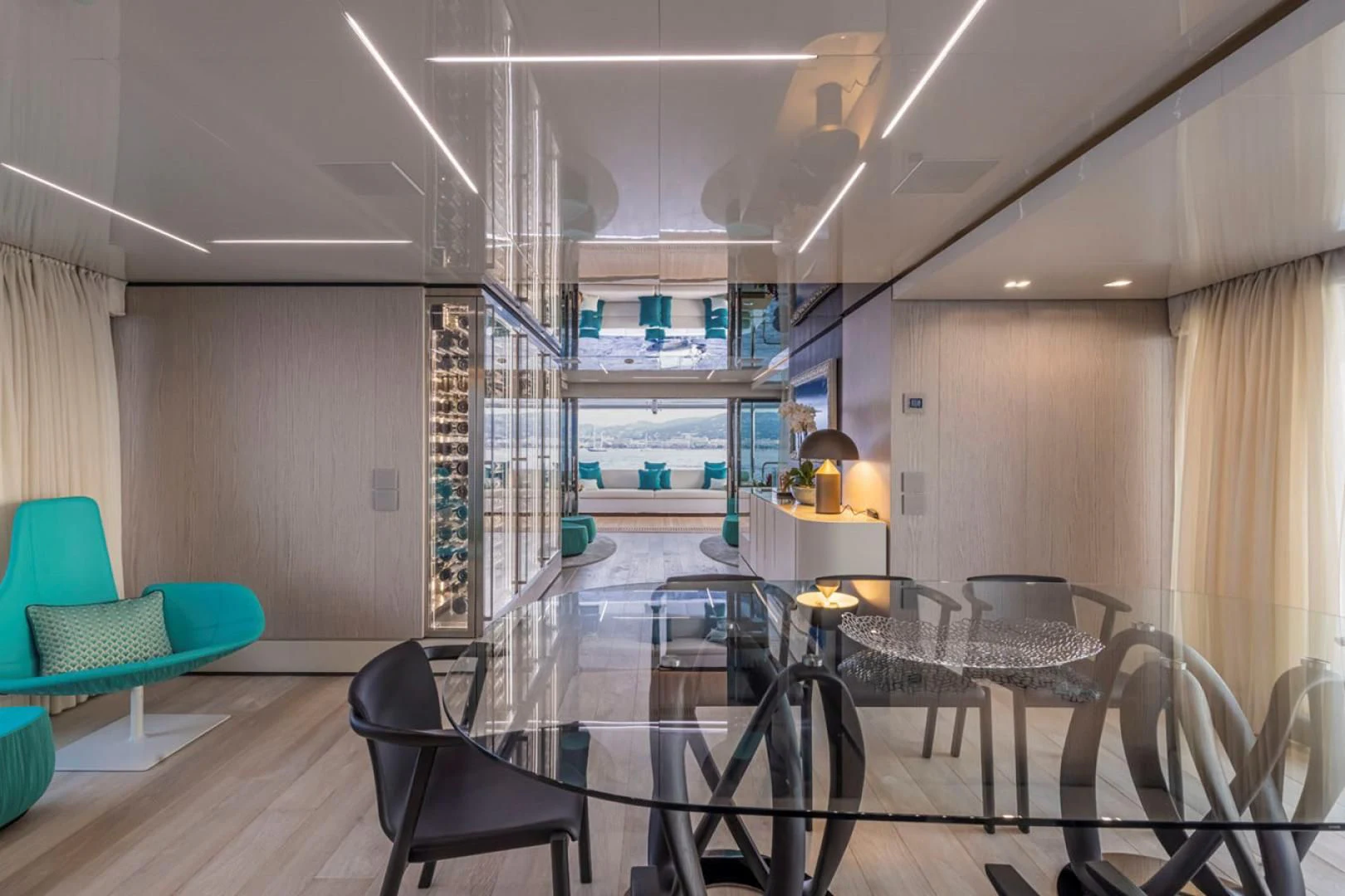 a room with a table chairs and a glass wall aboard 38M EXPLORER HULL 3 Yacht for Sale