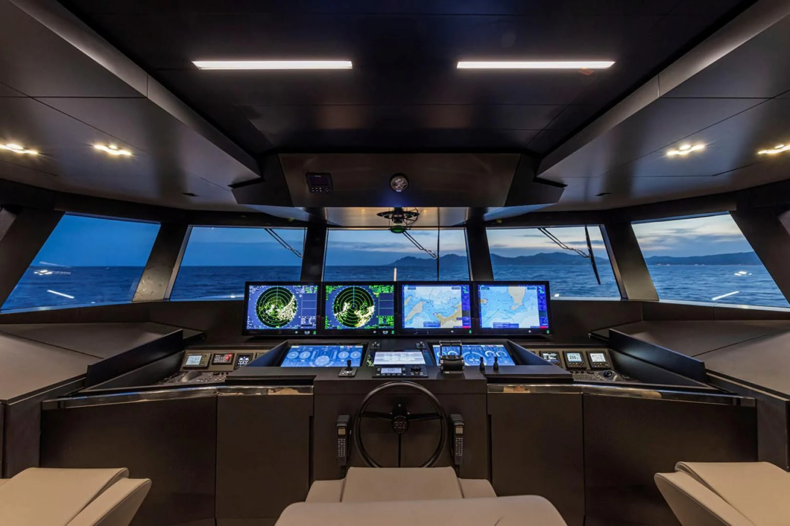 a control panel with many screens aboard 38M EXPLORER HULL 3 Yacht for Sale