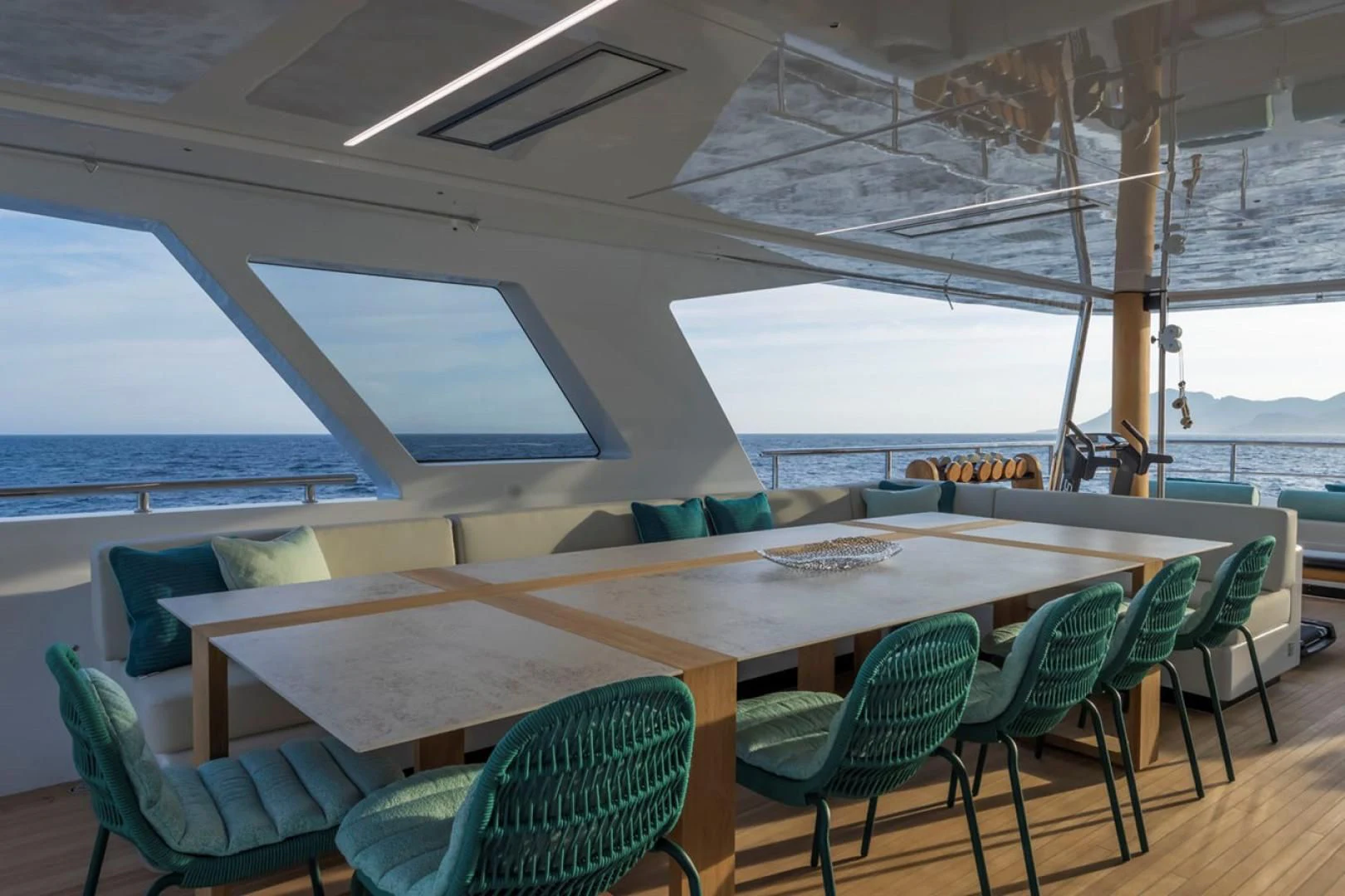 a table with chairs around it aboard 38M EXPLORER HULL 3 Yacht for Sale