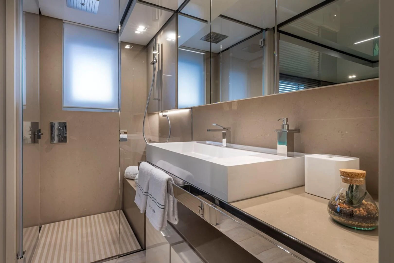 a bathroom with a large mirror aboard 38M EXPLORER HULL 3 Yacht for Sale