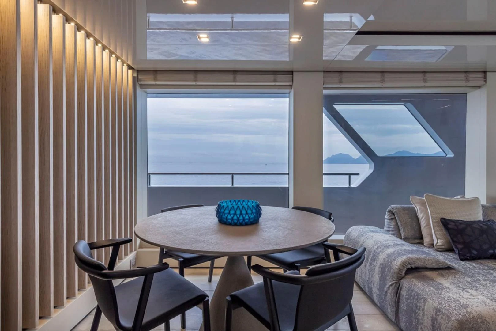 a room with a table and chairs aboard 38M EXPLORER HULL 3 Yacht for Sale