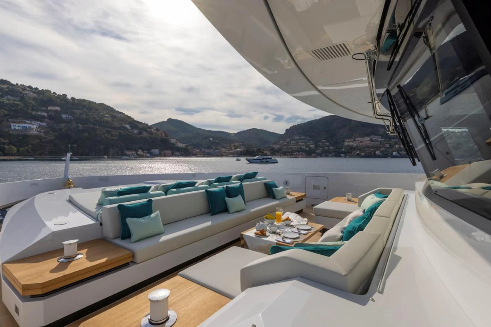 a room with a view of the ocean and mountains aboard 38M EXPLORER HULL 3 Yacht for Sale