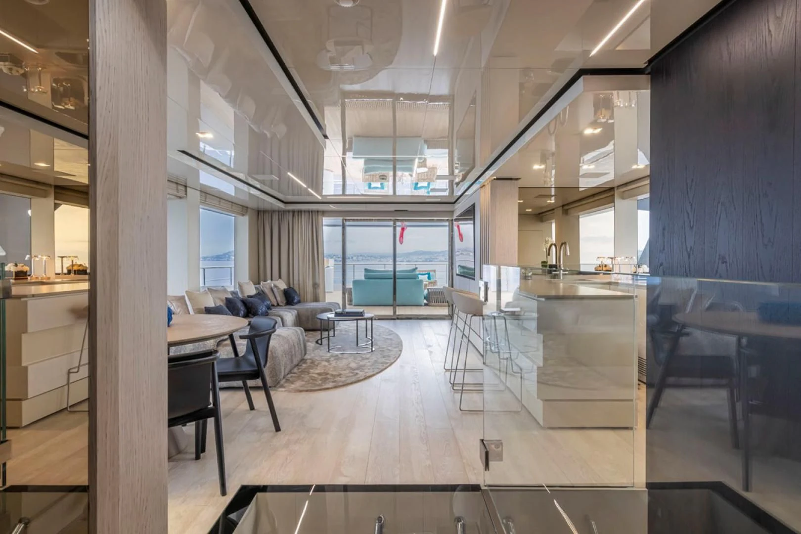 a room with tables and chairs aboard 38M EXPLORER HULL 3 Yacht for Sale