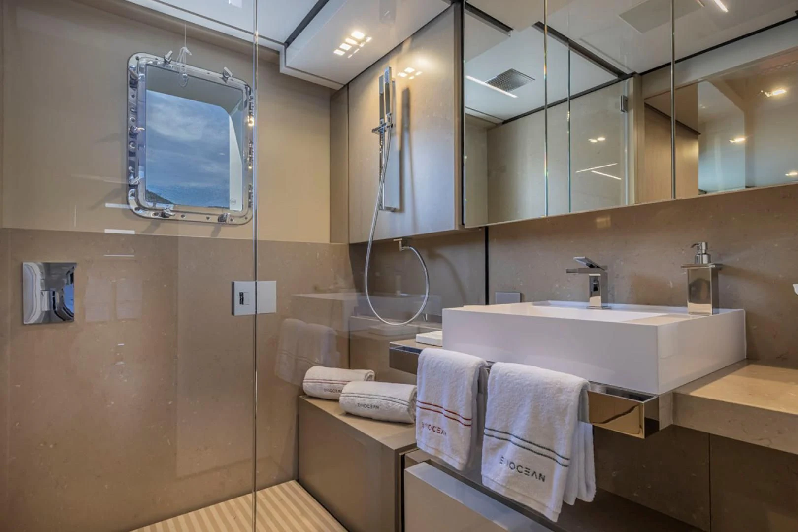 a bathroom with a sink and mirror aboard 38M EXPLORER HULL 3 Yacht for Sale