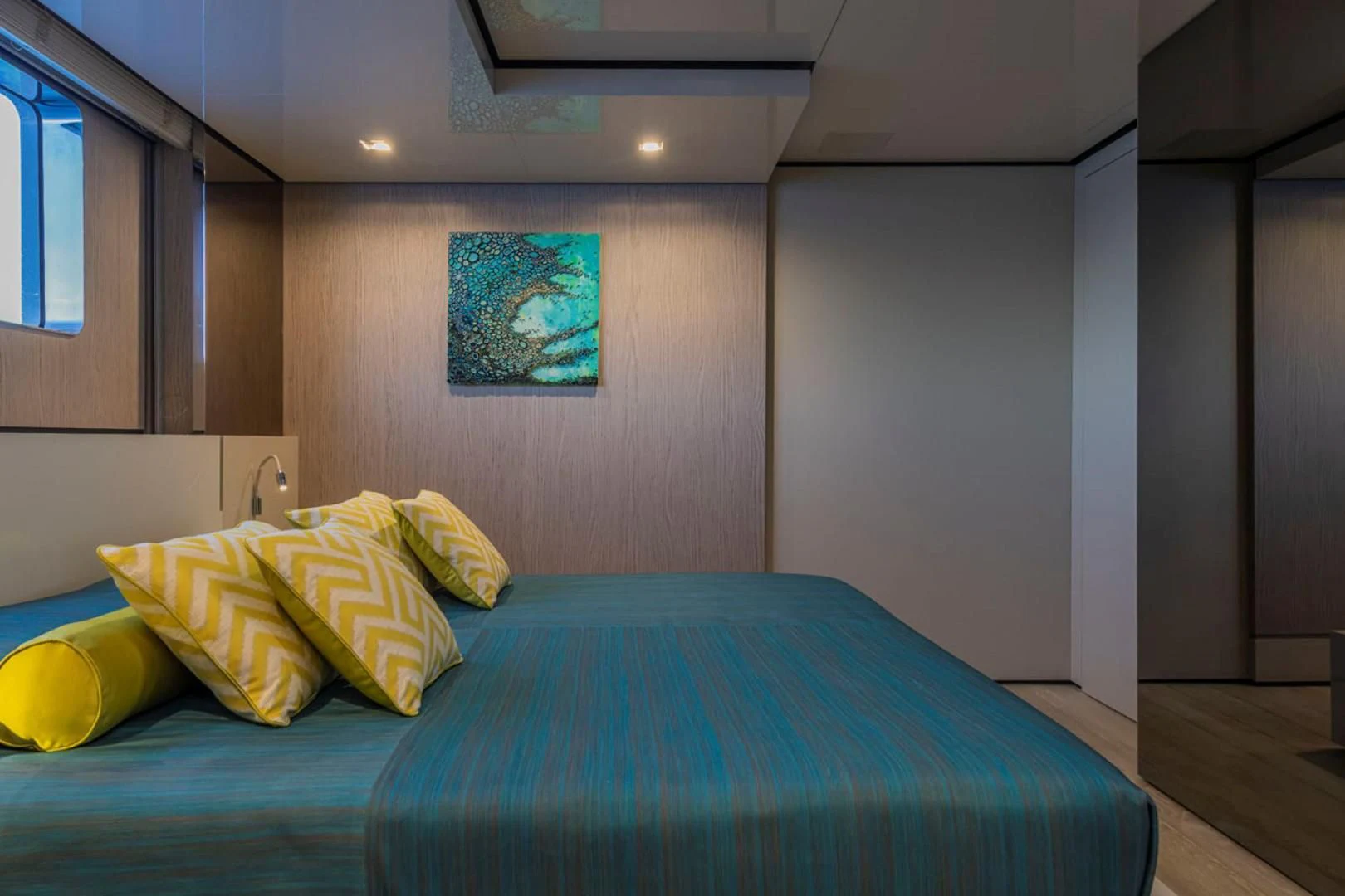 a bed with colorful pillows aboard 38M EXPLORER HULL 3 Yacht for Sale