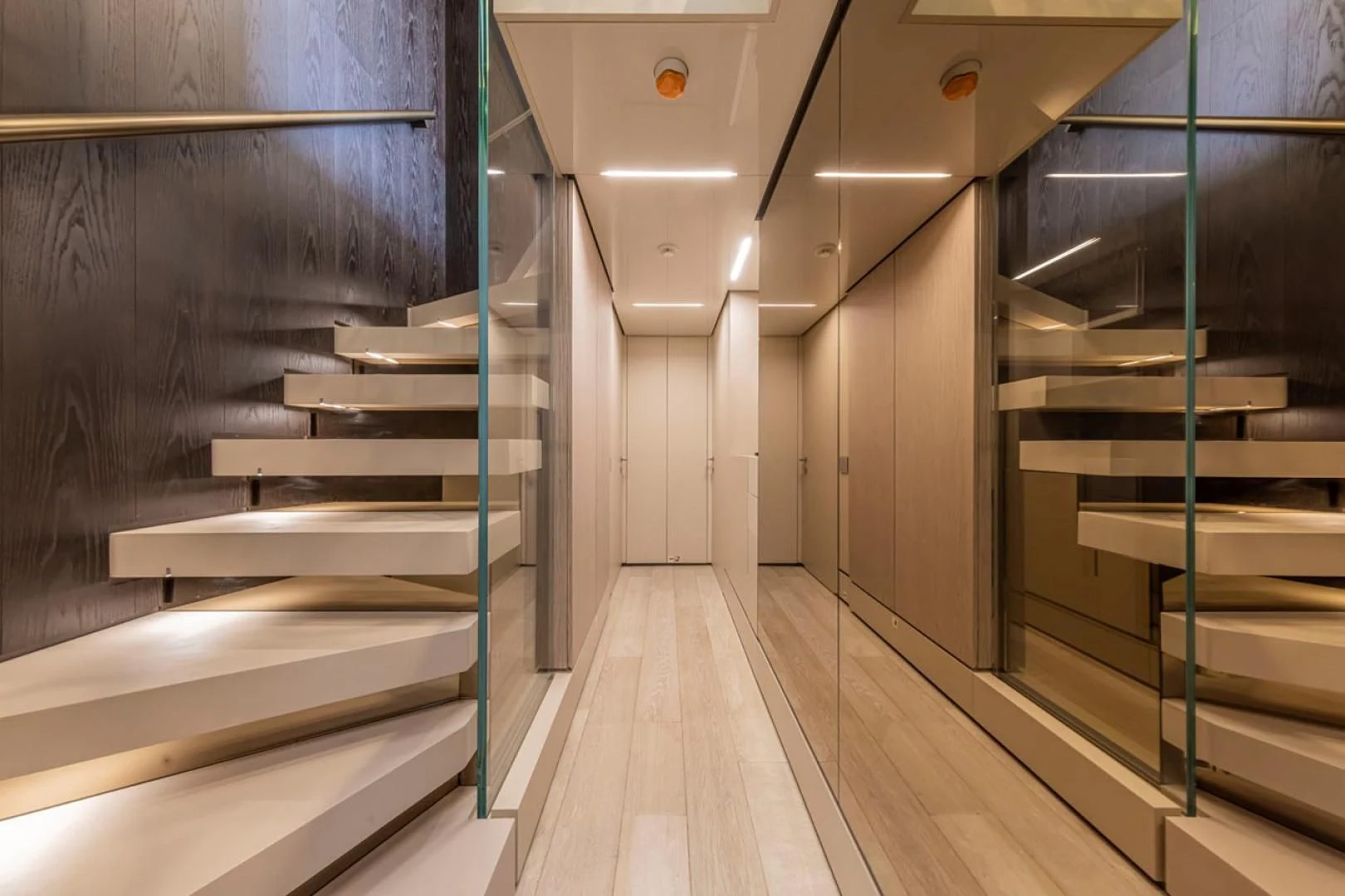 a room with a wood floor and a staircase aboard 38M EXPLORER HULL 3 Yacht for Sale