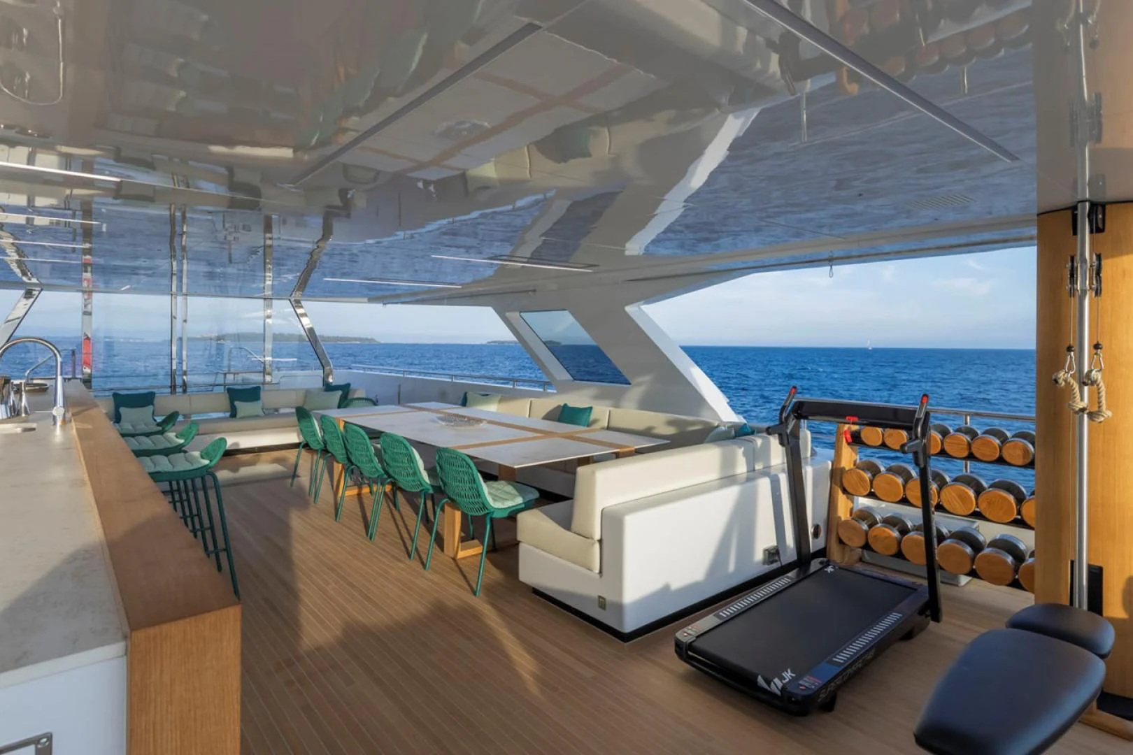 a room with a deck and chairs aboard 38M EXPLORER HULL 3 Yacht for Sale