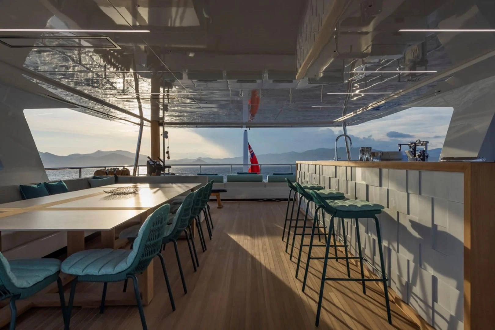 a room with tables and chairs aboard 38M EXPLORER HULL 3 Yacht for Sale