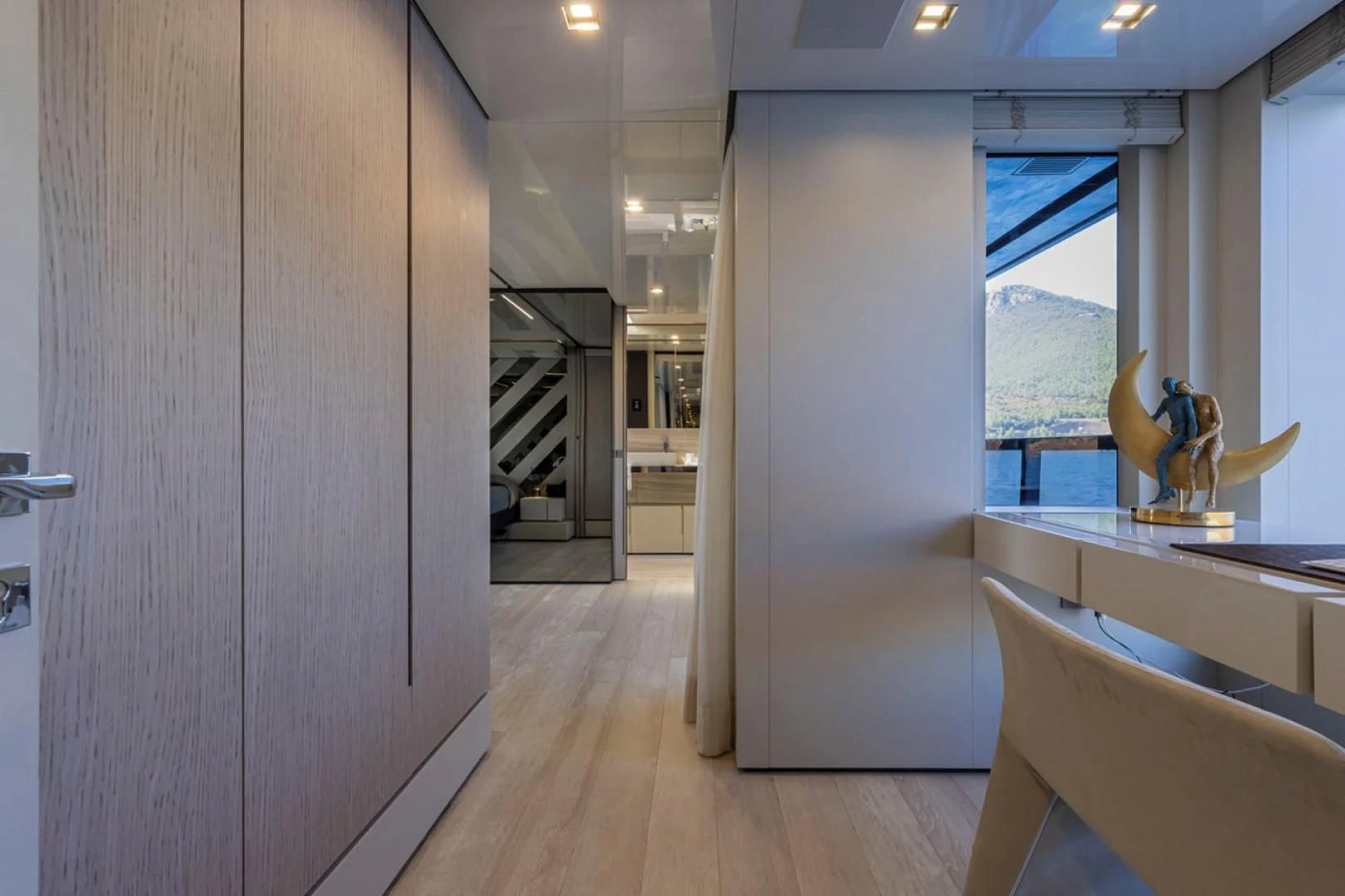 a room with a large glass door and a statue on the wall aboard 38M EXPLORER HULL 3 Yacht for Sale