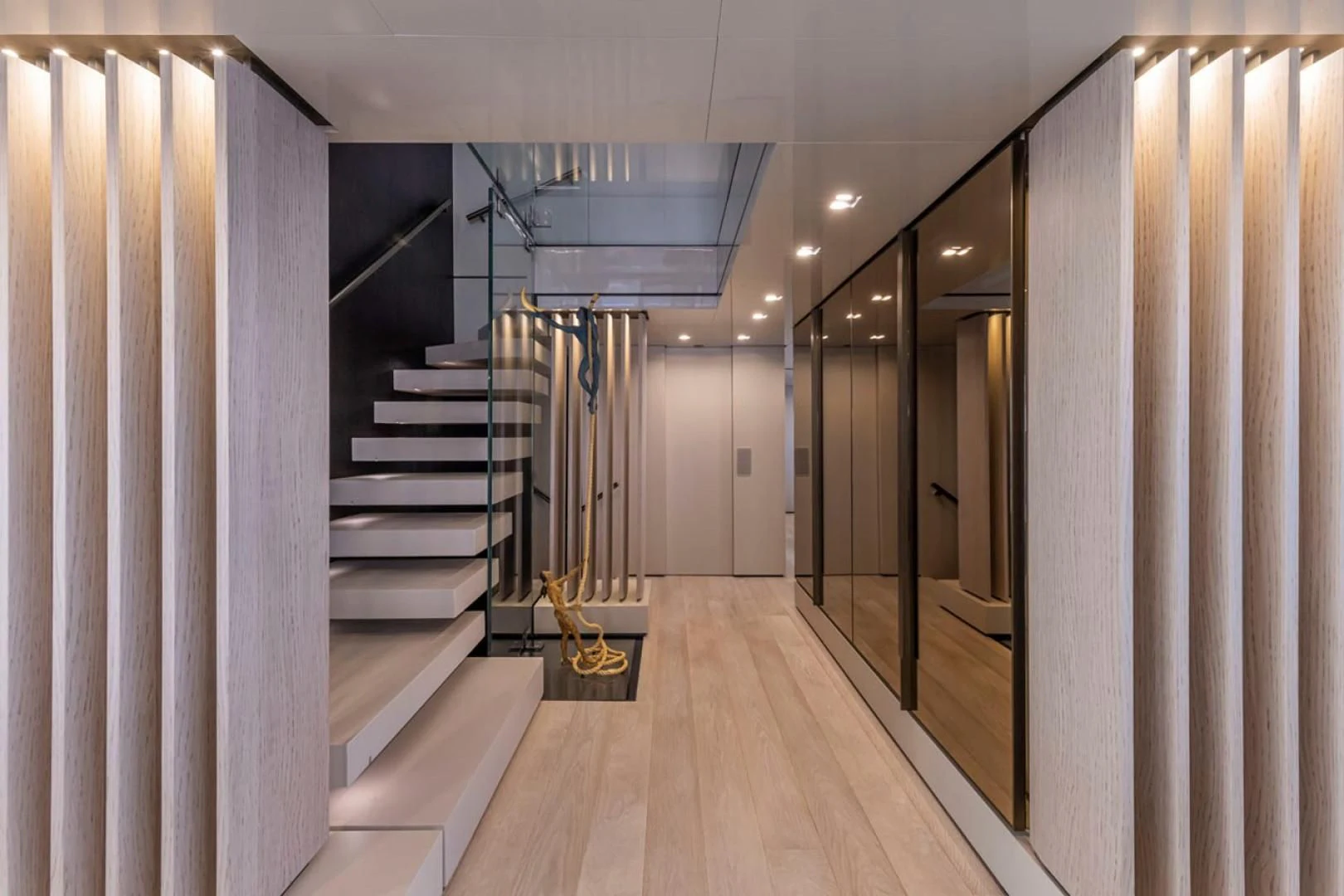 a hallway with a staircase and a staircase aboard 38M EXPLORER HULL 3 Yacht for Sale