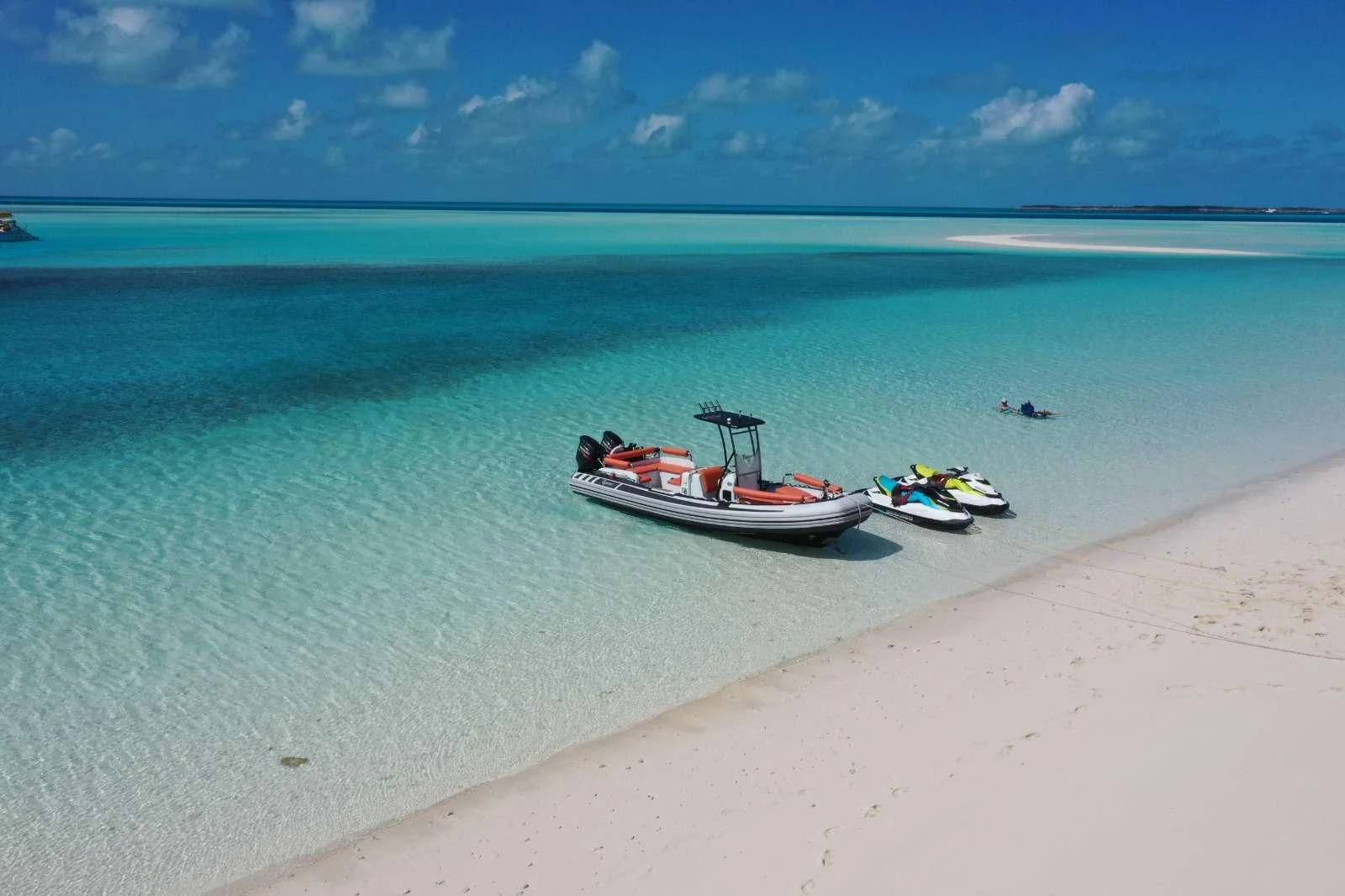 boats on a beach aboard EQUINOX X Yacht for Sale