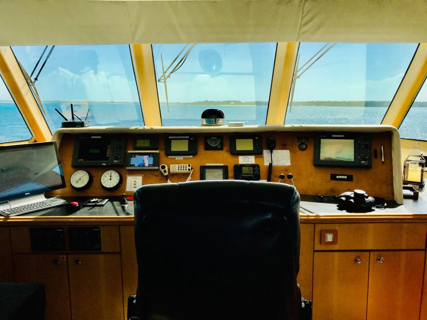 a computer desk with a chair aboard EQUINOX X Yacht for Sale