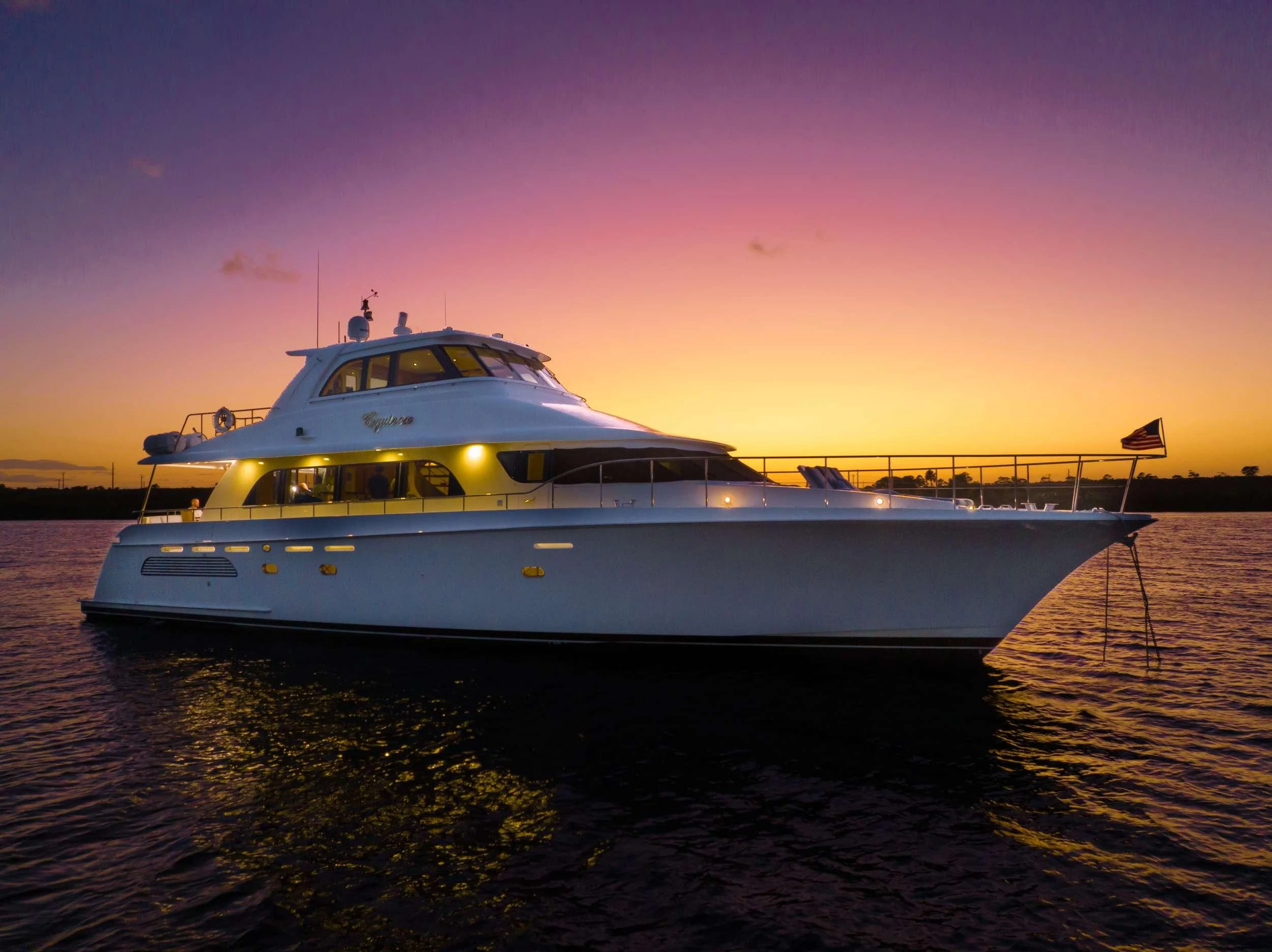 a boat on the water aboard EQUINOX X Yacht for Sale