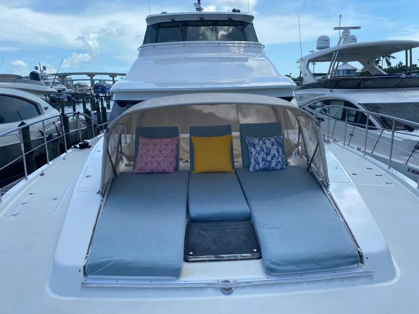 a boat with a seat on the deck aboard EQUINOX X Yacht for Sale