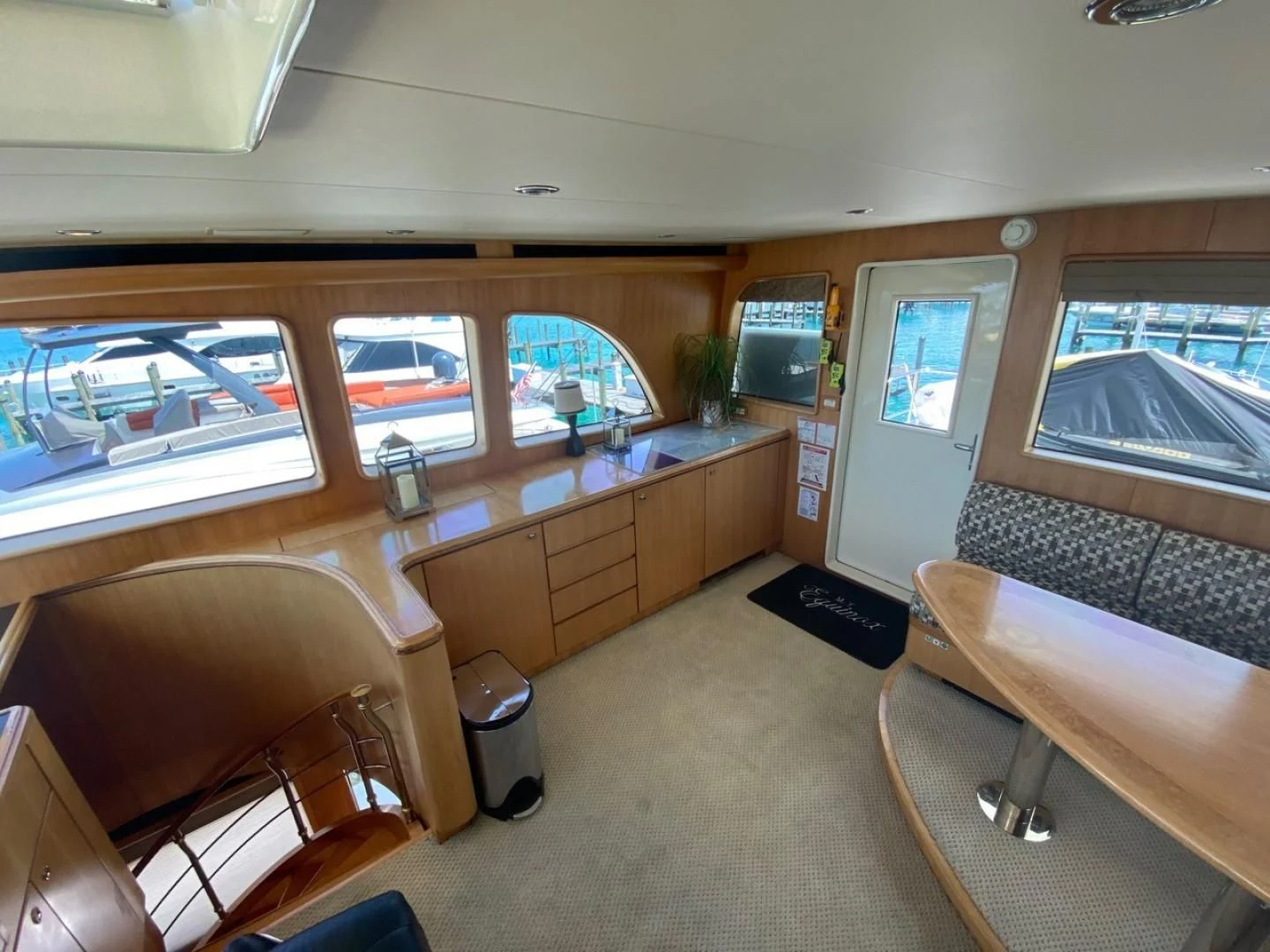 inside of a vehicle with a large window and a view of the water aboard EQUINOX X Yacht for Sale
