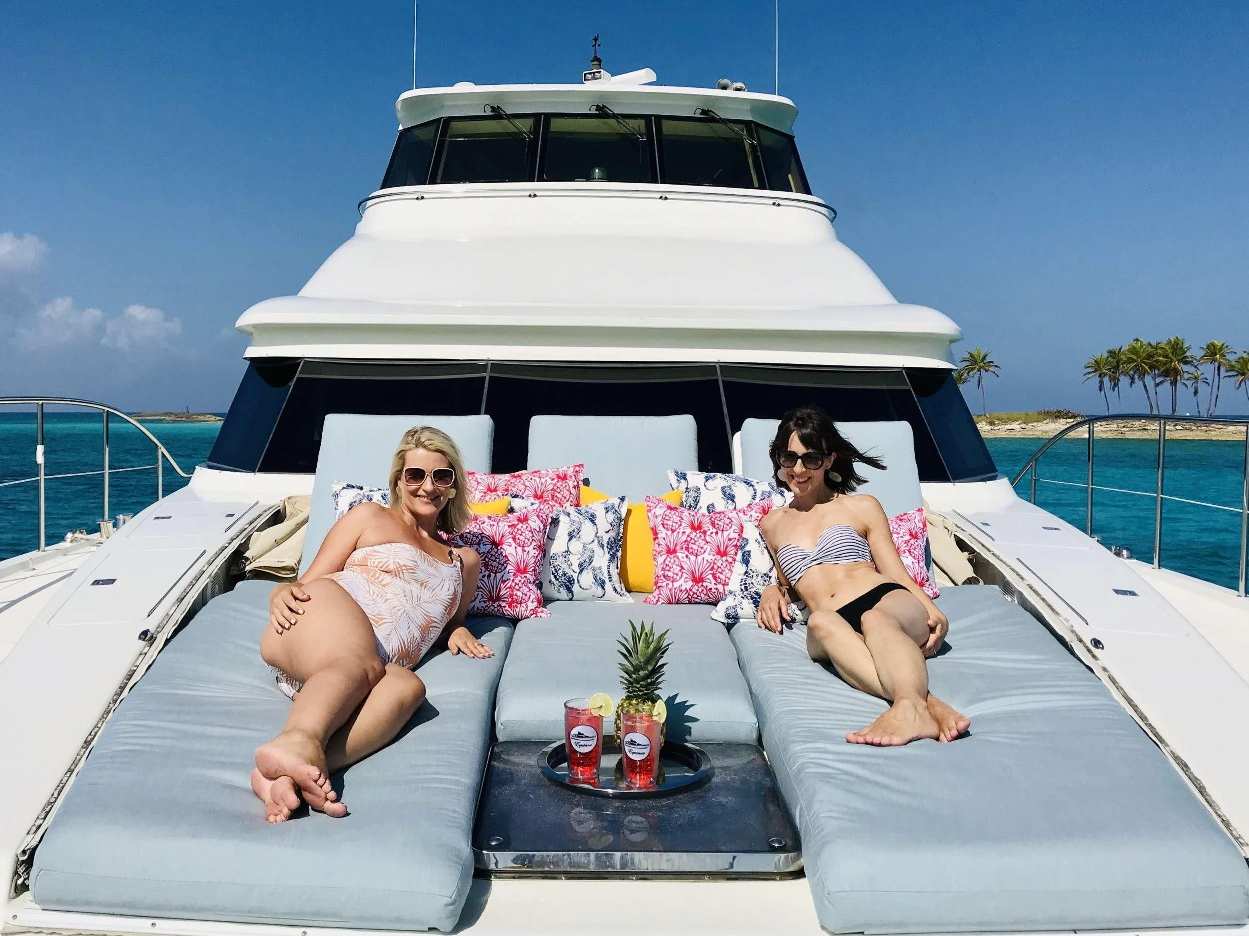 two women sitting on a boat aboard EQUINOX X Yacht for Sale