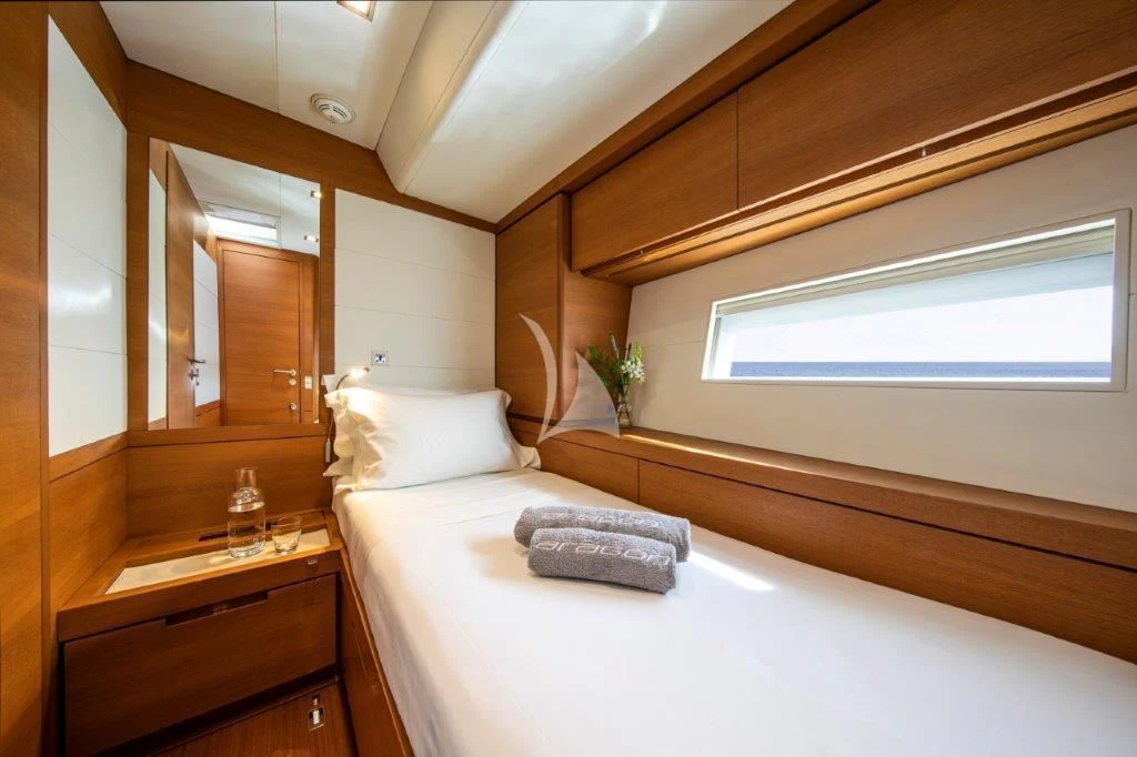 a bathroom with a large white bed aboard ARAGON Yacht for Sale