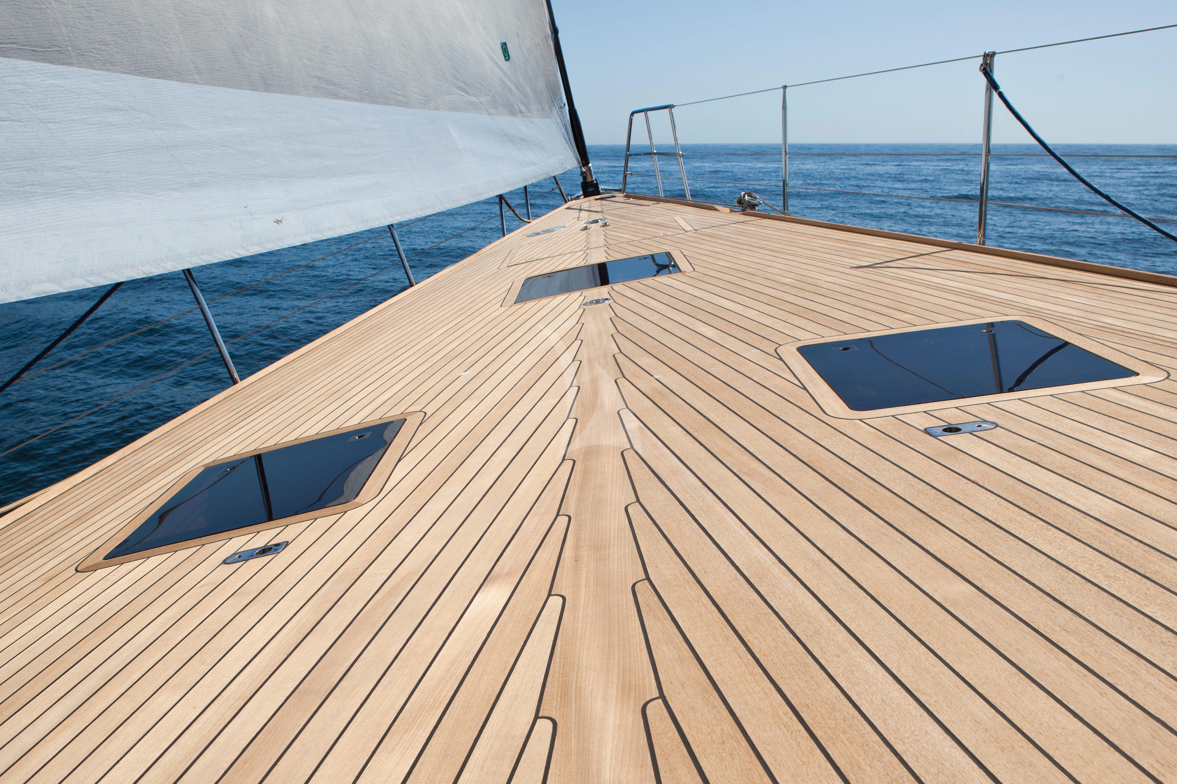 a wooden dock with a boat on it aboard ARAGON Yacht for Sale