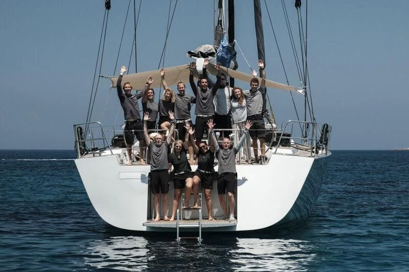 a group of people on a boat aboard ARAGON Yacht for Sale