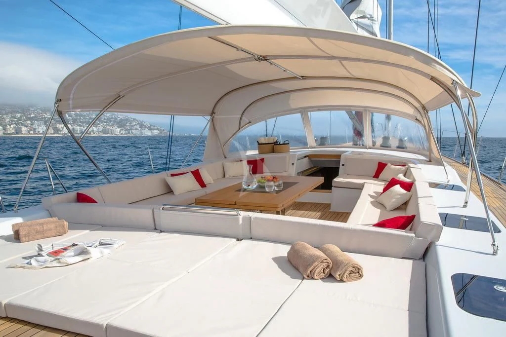 a boat with a table and chairs on it aboard ARAGON Yacht for Sale