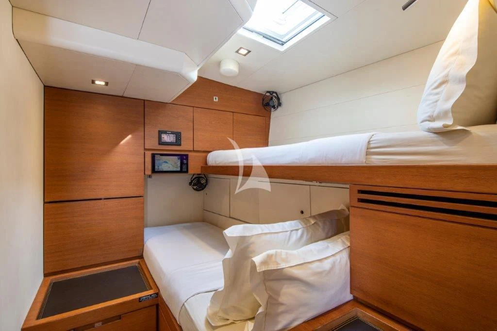a room with bunk beds aboard ARAGON Yacht for Sale