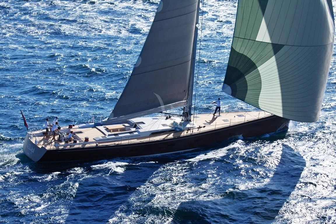 a group of people in a sailboat on the water aboard ARAGON Yacht for Sale