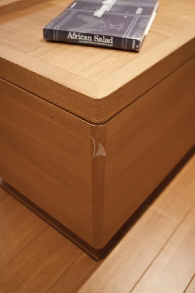 a book on a table aboard ARAGON Yacht for Sale