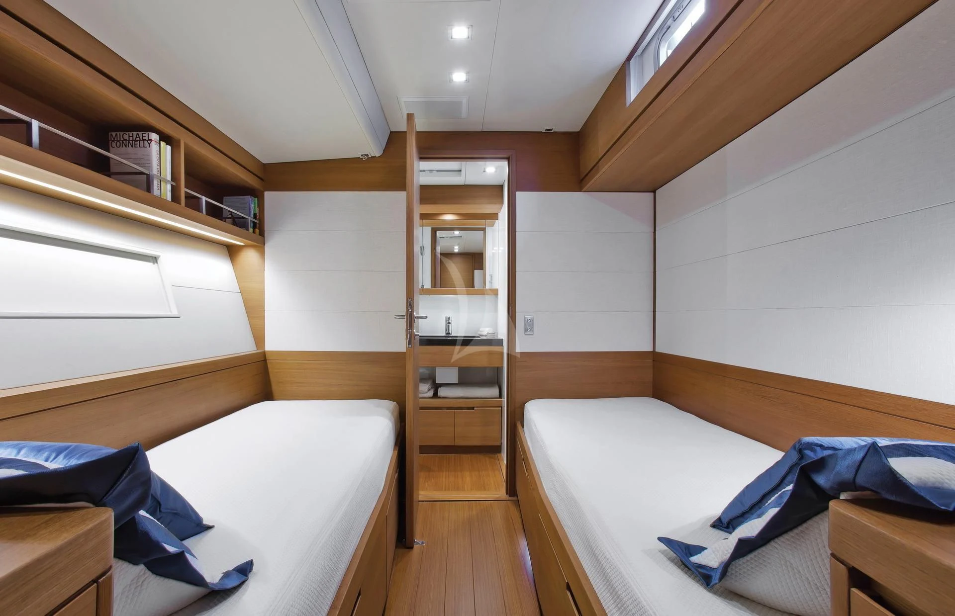 a room with a bed and a shelf aboard ARAGON Yacht for Sale