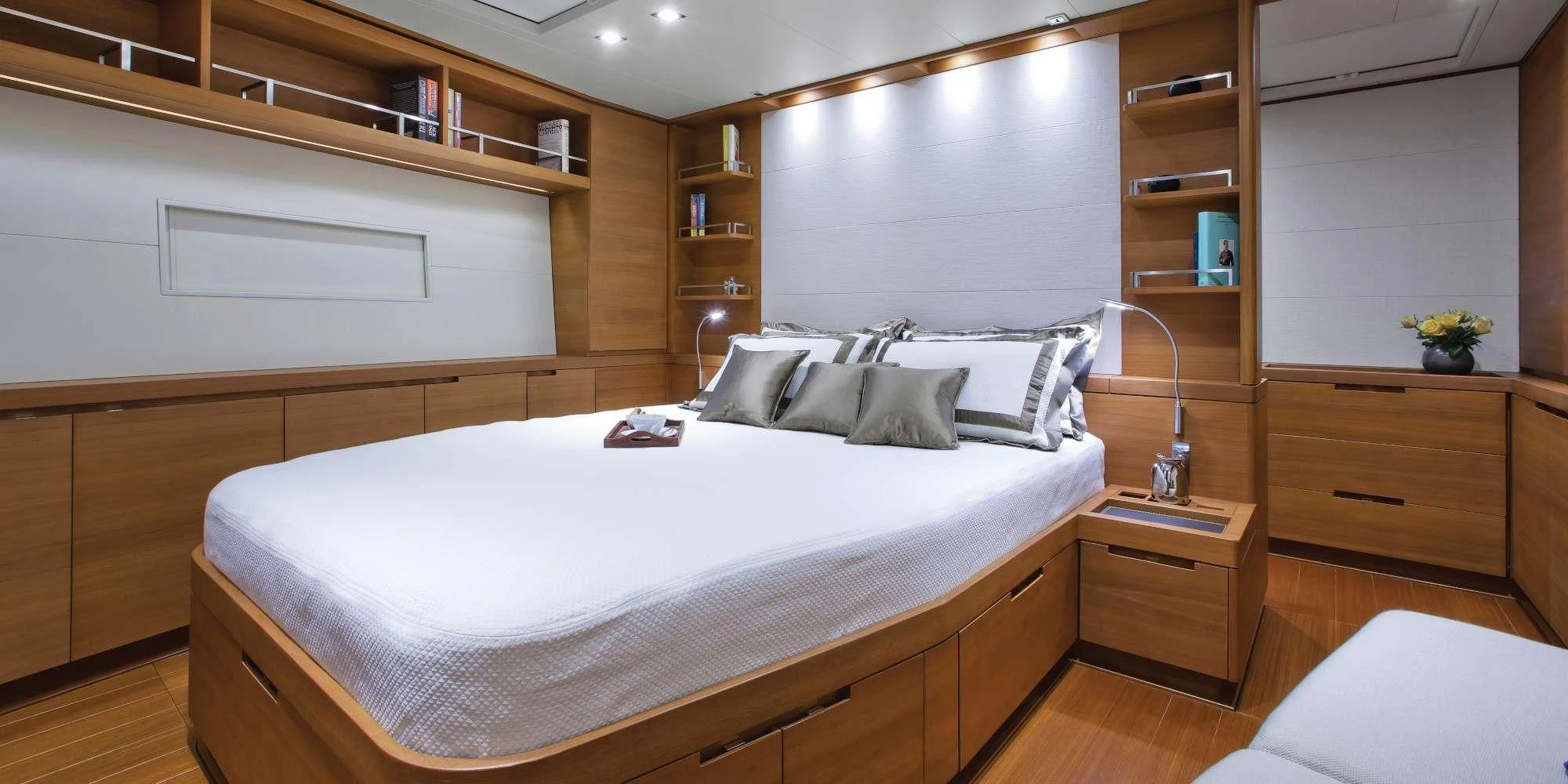 a room with a bed and a desk aboard ARAGON Yacht for Sale