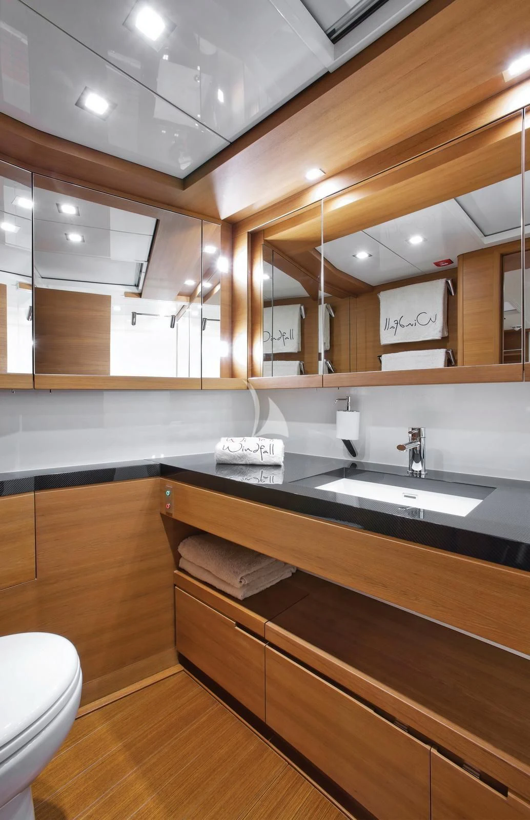 a bathroom with a large mirror aboard ARAGON Yacht for Sale