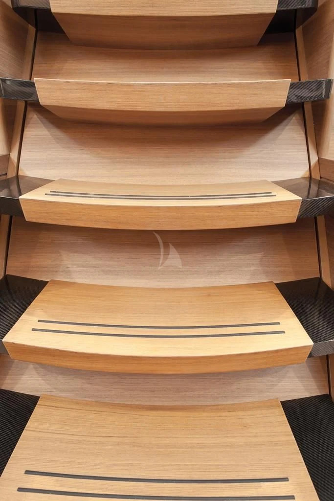a stack of books aboard ARAGON Yacht for Sale