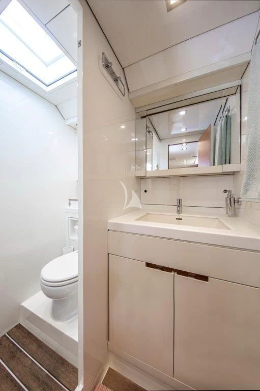 a bathroom with a sink and a toilet aboard ARAGON Yacht for Sale
