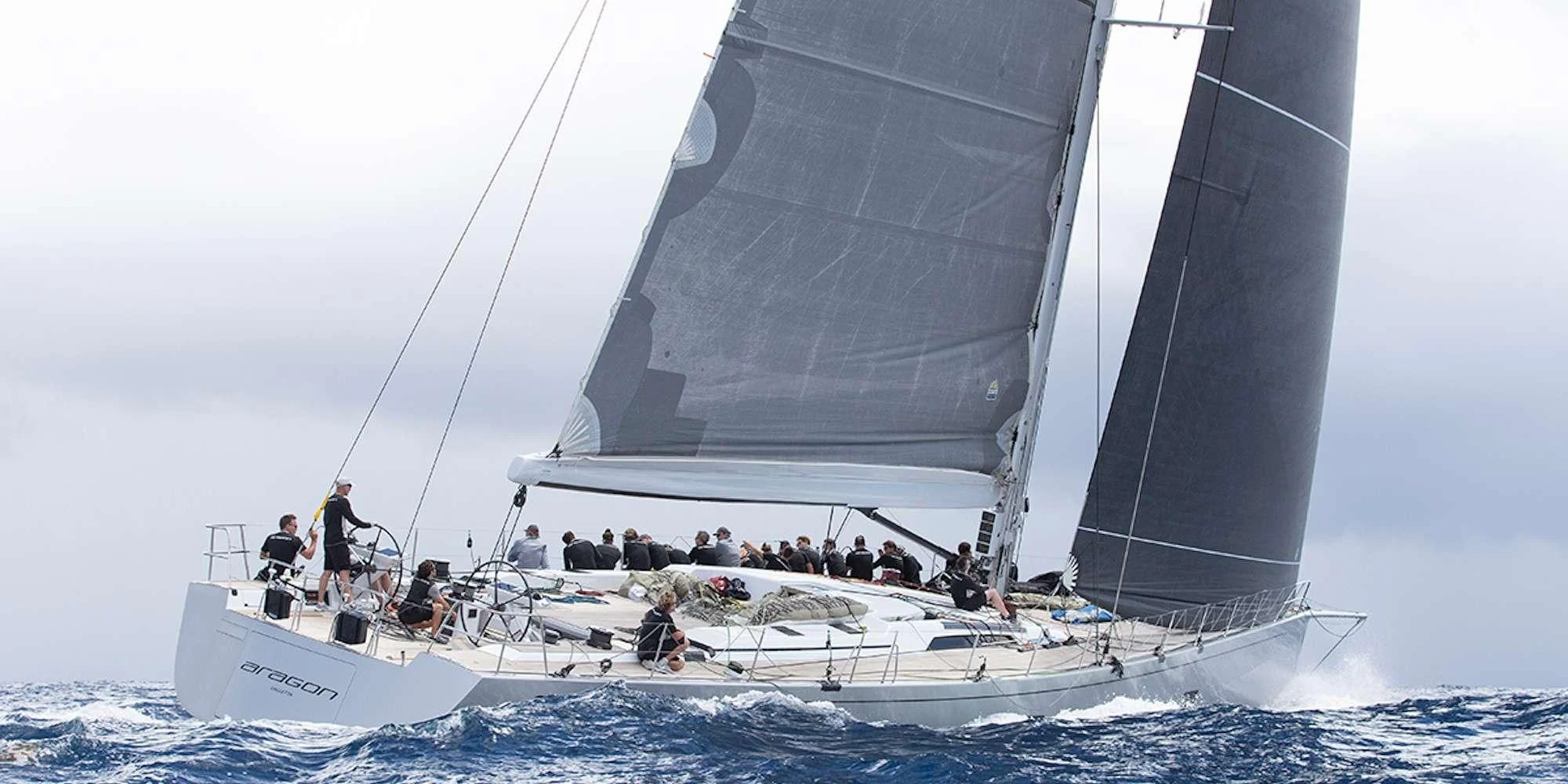 a group of people on a boat aboard ARAGON Yacht for Sale