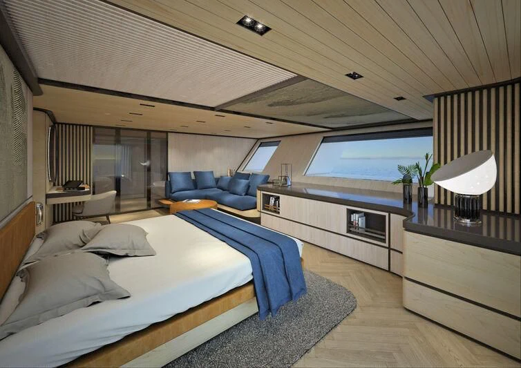 a bedroom with a bed and a couch aboard CAPRICA Yacht for Sale