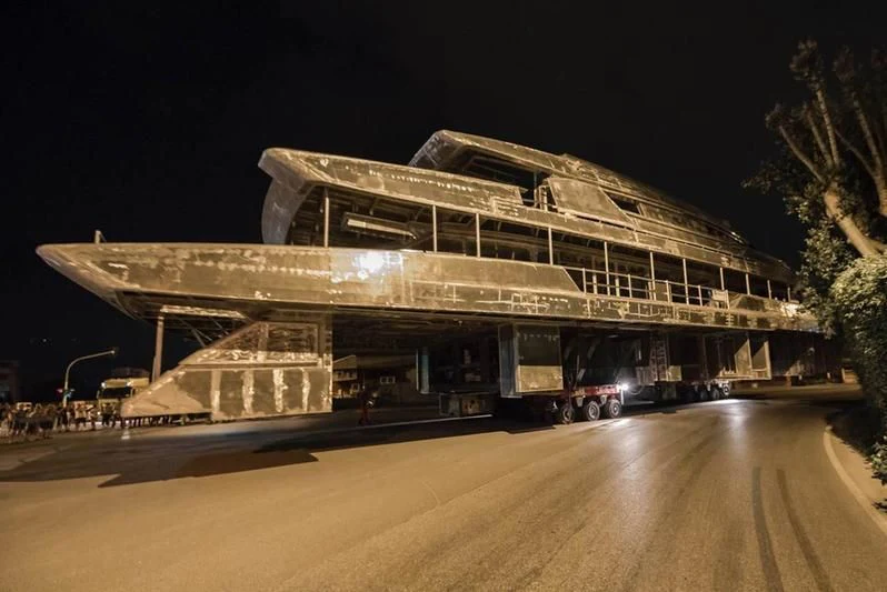 a large building with a car parked in front of it aboard ATTILA Yacht for Sale