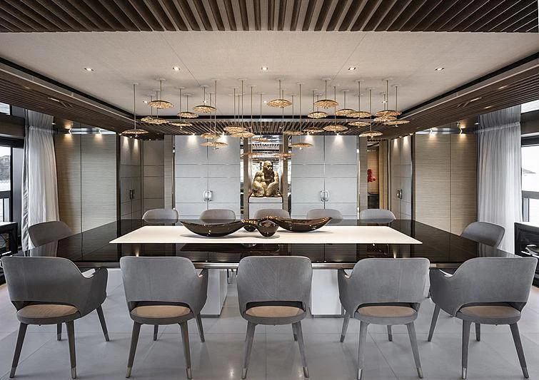 a large kitchen with a chandelier aboard ATTILA Yacht for Sale