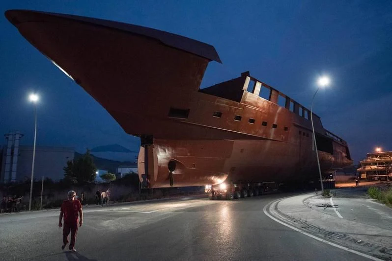 a person walking on a street aboard ATTILA Yacht for Sale