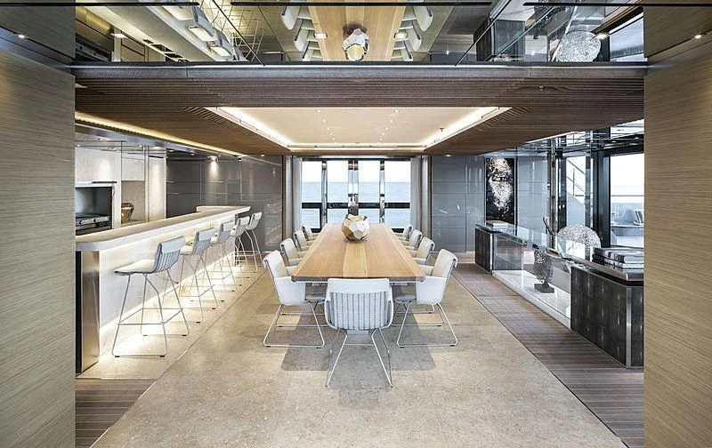 a room with tables and chairs aboard ATTILA Yacht for Sale
