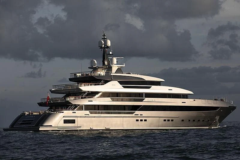 a large white ship in the water aboard ATTILA Yacht for Sale